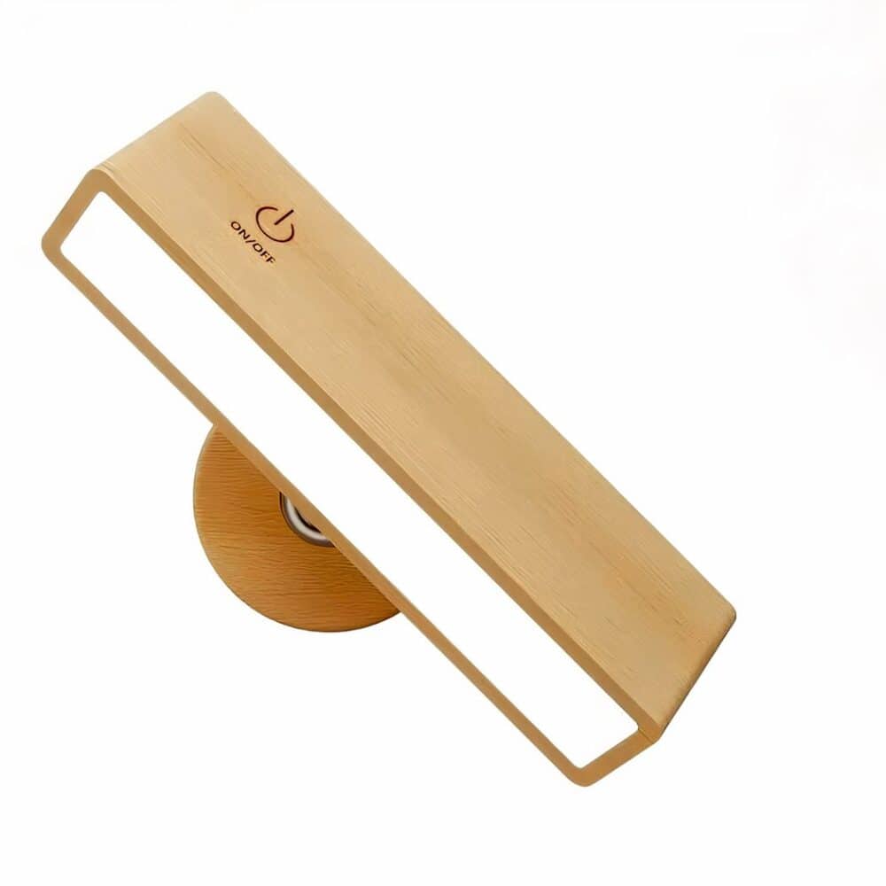 Applique murale liseuse avec socle rond couleur bois et rectangle lumineux couleur bois avec le symbole on/off sur le dessus. Sur fond blanc.